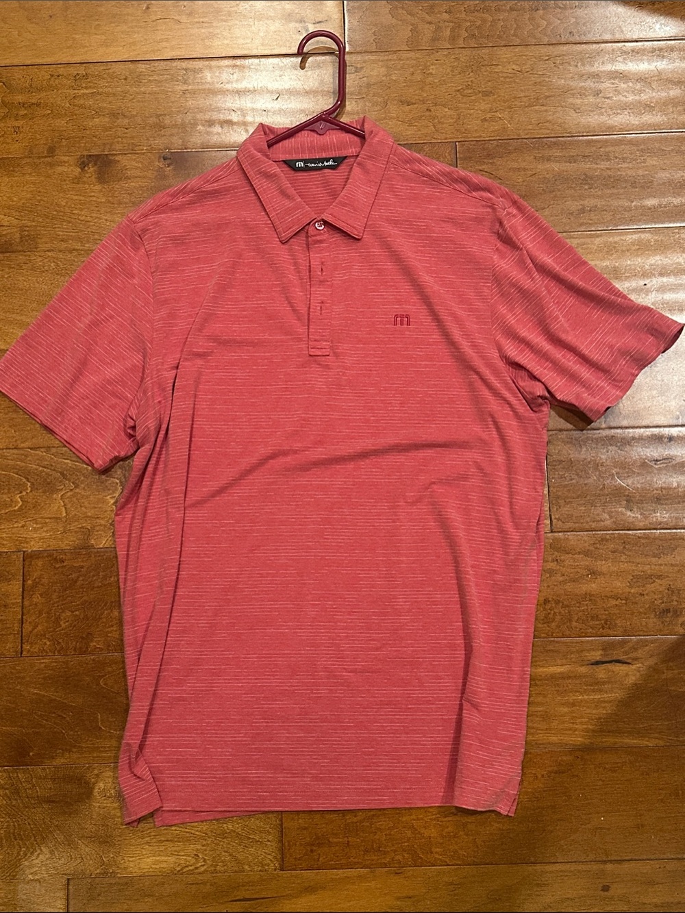 Travis Mathew Heathered Coral Polo